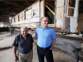 Mayor Drew Dilkens, shown here with businessman George Sofos on Aug. 10, 2017, in front of Streetcar No. 351 which once rolled on the streets of Windsor. Windsor was the first city in Canada to have streetcars, starting in 1886.