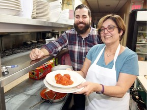 Tony Migliarese, left, has returned from Calgary to help his mother, Rose Migliarese, at Divino Trattoria in Essex. Tony's father, Mario, is battling pancreatic cancer.