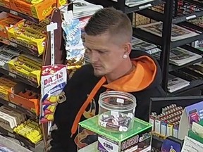 Essex County OPP are looking for a man they say stole a credit card from a car on Oct. 15 then went used it at four different stores.