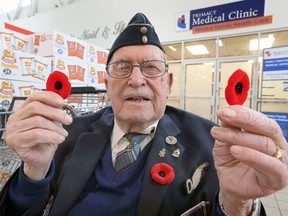 Royal Canadian Air Force veteran Art Anderson, 99, honours his comrades by selling Remembrance Day poppies at the Superstore on Dougall Avenue Tuesday. Anderson feels it's his duty to sell poppies for all the servicemen and women who gave the ultimate sacrifice. During the Second World War, Anderson, a navigator on a C-47 Dakota, and his crewmates were shot down behind enemy lines near Arnhem, The Netherlands in September 1944. He survived the crash but was later captured and spent years in a German POW camp.