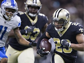 Marshon Lattimore  of the New Orleans Saints returns an interception for a touchdown against the Detroit Lions at Mercedes-Benz Superdome on Oct. 15, 2017 in New Orleans.  The Saints defeated the Lions 52-38.