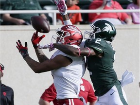 Cornerback Justin Layne #2 of the Michigan State Spartans breaks up a pass intended for wide receiver Simmie Cobbs Jr. #1 of the Indiana Hoosiers during the first half at Spartan Stadium on Oct. 21, 2017 in East Lansing, Michigan.