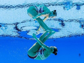 A picture taken with an underwater camera shows Canada's Jacqueline Simoneau competing in the Women Solo free routine final during the synchronised swimming competition at the 2017 FINA World Championships in Budapest, on July 19, 2017.