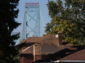 The Ambassador bridge is seen above an area being cleared to to make way for a new span between Windsor, Ontario and Detroit, Michigan.