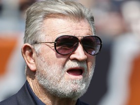 In this Sept. 10, 2017,  photo, former Chicago Bears head coach Mike Ditka watches from the sideline during the first half of an NFL football game between the Bears and the Atlanta Falcons, in Chicago. Ditka is apologizing for saying he wasn't aware of any racial oppression in the U.S. over the last 100 years. The famed former Chicago Bears coach issued the apology Tuesday, Oct. 10, 2017, a day after he made the comments during a radio interview while discussing National Football League players kneeling during the national anthem.