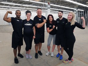 The True Fitness team including Wayne Bridge, left, Jessica Mendez, owner Luis Mendez, Gabby Tetreault, Marc Gaudette and Hannah Bruner pose in June 2017 in the space at 443 Ouellette Ave., that would become the home of the new fitness centre.