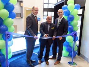 Windsor Mayor Drew Dilkens, left, Shmuel Farhi, president of Farhi Holdings Corporation, and Tyler McDiarmid, CEO of Ironwood Management Corporation, attend the grand opening of Holiday Inn Express in downtown Windsor on Oct. 25, 2017. The old Travelodge hotel got a new name and new look. Price tag: $10 million.
