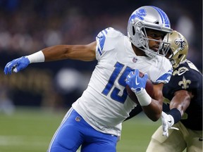 In this Oct. 15, 2017, photo, Detroit Lions wide receiver Golden Tate carries for a touchdown past New Orleans Saints free safety Marcus Williams in the first half of an NFL football game in New Orleans. The Lions could not have picked a better time to have their bye. Matthew Stafford, Golden Tate and Glover Quin are just a few of Detroit's banged-up players who should benefit from the week off.