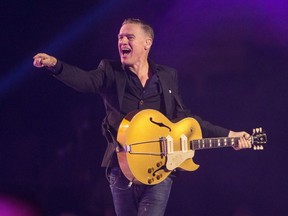 Bryan Adams performs during the Invictus Games closing ceremony in Toronto on September 30, 2017. The Kingston, Ont.-born musician pegged Nov. 3 for the release of "Ultimate," his first studio effort in two years.