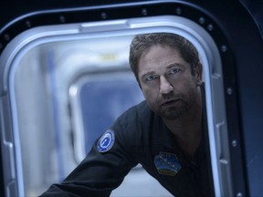 This image released by Warner Bros. Entertainment Inc. shows Gerard Butler in a scene from "Geostorm." (Ben Rothstein/Warner Bros. Entertainment Inc. via AP)