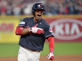 Cleveland Indians' Francisco Lindor reacts after hitting a grand slam off New York Yankees relief pitcher Chad Green during the sixth inning of Game 2 of a baseball American League Division Series in Cleveland on Oct. 6, 2017,