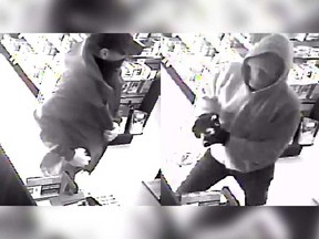 Security camera images of two masked males who robbed a pharmacy in the 3800 block of Dougall Avenue on Oct. 25, 2017.