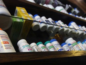 Shelves of medication are shown at a Windsor pharmacy in this May 2010 file photo.