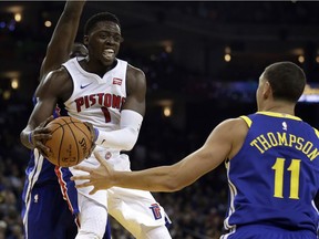 Detroit Pistons' Reggie Jackson, left, looks to pass away from Golden State Warriors' Golden State Warriors' Klay Thompson during the first half of an NBA basketball game on Oct. 29, 2017, in Oakland, Calif.