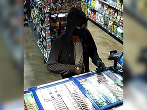 A security camera image of a masked man who robbed a Mac's convenience store at 2055 Sandwich West Parkway in LaSalle during the early morning hours of Oct. 12, 2017.