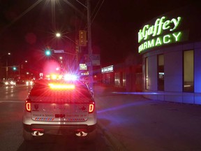 A Windsor police vehicle at the scene of a shooting in front of McGaffey Pharmacy at 3955 Tecumseh Rd. East on the evening of Oct. 18, 2017.