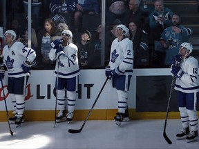 Toronto Maple Leafs center Patrick Marleau, right, looks up at the video screen as he is honored before an NHL hockey game against the San Jose Sharks, his former team, Monday, Oct. 30, 2017, in San Jose, Calif. (AP Photo/Marcio Jose Sanchez)