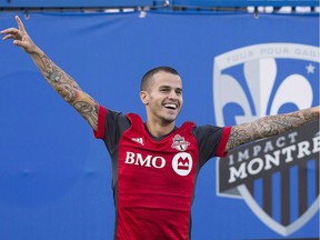 Toronto FC's Sebastian Giovinco celebrates scoring against the Montreal Impact during second half MLS soccer action in Montreal, Sunday, August 27, 2017.