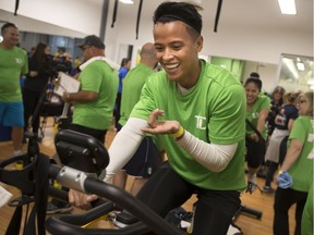 Miguel Velasquez, from TD Canada Trust, participates in the JDRF Revolution Ride to Defeat Diabetes at the YMCA at the YMCA, Friday, Oct. 13, 2017.  Fifteen teams from various corporate sponsors participated in the fundraiser for the Juvenile Diabetes Research Foundation.