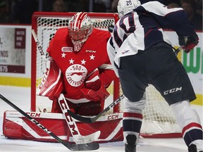 Forward Luke Kutkevicius had one of the Windsor Spitfires' two goals against Sault Ste. Marie Greyhounds goalie Matthew Vilalta.in Saturday's 4-2 loss at the WFCU Centre.

,who had a goal and an assist on Friday fires a shot high on Sault Ste. Marie Greyhounds goalie Matthew Vilalta.