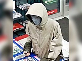 A security camera image of the masked man who robbed a Mac's Convenience Store at 2675 Lauzon Rd. during the early morning hours of Oct. 3, 2017.