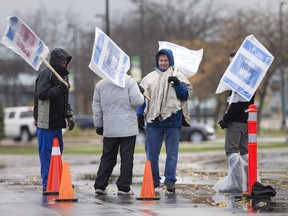 Faculty from St. Clair College remain on the picket line at the main campus on Oct. 30, 2017.