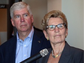Ontario Premier Kathleen Wynne and Michigan Gov. Rick Snyder during the opening day of this year's Great Lakes and St. Lawrence Governors and Premiers Conference held at the Art Gallery of Windsor, Oct. 20, 2017.