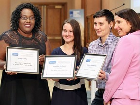 Athena Scholarship recipients Lacy Carty, left, Cessidia DeBiasio and Victoria Chlumecky pose for photos with guest speaker Bethany Toldo on Friday during 18th annual Athena Scholarship Luncheon supported by Windsor-Essex Chamber of Commerce at the Caboto Club of Windsor.