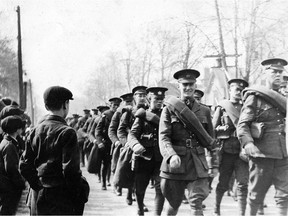 Troops parade along a Windsor street in 1916 as the First World War rages on in Europe. In the centre of the photo smiling at the camera is Bernard Bates. Born in 1898, he enlisted on March 11, 1916. He was killed Sept. 15, 1916.