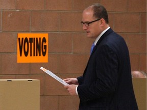 Then mayoral candidate Drew Dilkens casts his ballot at South Windsor Arena on Oct. 27, 2014.
