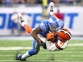 Detroit's Darius Slay of the Detroit Lions levels Rashard Higgins of Cleveland during the first half of an NFL game at Ford Field on Nov. 12, 2017.