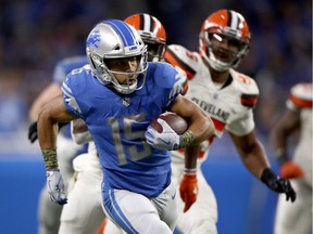 Golden Tate of the Detroit Lions runs with the ball after a catch for a touchdown against the Cleveland Browns during the fourth quarter at Ford Field on Nov. 12, 2017, in Detroit.