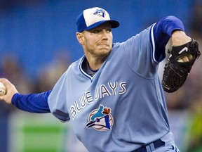 In this Sept. 25, 2009 file photo, Roy Halladay pitches for the Toronto Blue Jays.