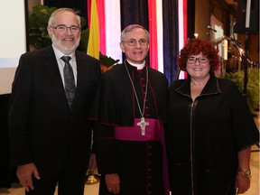 Honorary co-chairs Jim and Barb Holland flank Bishop Ronald Fabbro during the 2017 Bishop's Dinner for Windsor and Essex supporting St. Peter's Seminary.