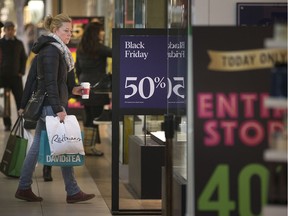 Shoppers hunt for Black Friday deals at Devonshire Mall on Nov. 24, 2017.