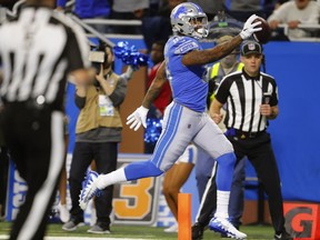 Detroit Lions tight end Eric Ebron runs into the endzone for a 29-yard reception for a touchdown during the second half of an NFL football game against the Cleveland Browns on Nov. 12, 2017, in Detroit.