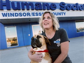 Melanie Coulter, executive director of the Windsor-Essex County Humane Society is shown with Topanga, one of the dogs up for adoption. The organization will soon serve the town of Amherstburg for dog-related issues.