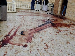 Blood on the veranda of the Al-Rawda mosque in a village in the northern Sinai Peninsula of Egypt after a deadly terror attack on Nov. 24, 2017.