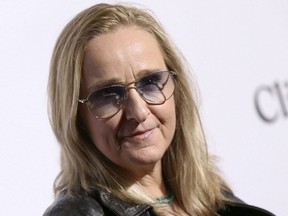 In this Feb. 14, 2016, photo, Melissa Etheridge arrives at the 2016 Clive Davis Pre-Grammy Gala in Beverly Hills, Calif. Etheridge has pleaded guilty to a misdemeanor charge of possessing marijuana in North Dakota. An attorney for the California musician entered the plea on her behalf Tuesday. Under a proposed order, Etheridge would pay a fine of $750 and serve unsupervised probation.