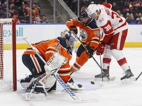 Detroit Red Wings Anthony Mantha (39) scores a goal on Edmonton Oilers goalie Cam Talbot (33) as Darnell Nurse (25) defends during third period NHL action in Edmonton, Alta., on Nov. 5, 2017.