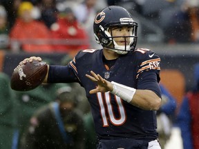 In this Nov. 12, 2017, photo, Chicago Bears quarterback Mitchell Trubisky (10) throws during the first half of an NFL football game against the Green Bay Packers in Chicago. Trubisky once again showed some promise last week, throwing for a career-high 297 yards and a touchdown. The Detroit Lions visit Chicago in Sunday.