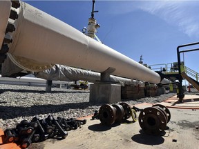 In this June 8, 2017 file photo, fresh nuts, bolts and fittings are ready to be added to the east leg of the pipeline near St. Ignace, Mich., as Canadian oil transport company Enbridge prepared to test the east and west sides of the Line 5 pipeline under the Straits of Mackinac.