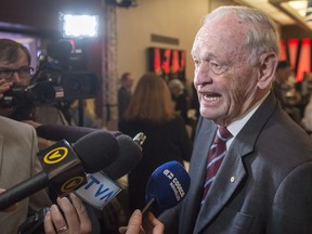 Former prime minister Jean Chretien speaks to reporters before addressing the Association of Philanthropy Professionals on Nov. 15, 2017, in Montreal.