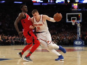 New York Knicks forward Kristaps Porzingis (6) drives against Toronto Raptors forward Pascal Siakam (43) during the third quarter of an NBA basketball game on Nov. 22, 2017, in New York. The Knicks won 108-100.