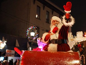 Santa and Mrs. Claus wave to the crowd at the end of the Windsor Santa Claus Parade on Sandwich Street in December 2011.