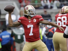 In this Dec. 11, 2016, photo, San Francisco 49ers quarterback Colin Kaepernick passes against the New York Jets during the first half of an NFL football game in Santa Clara, Calif.  Houston Texans coach Bill O'Brien says he and general manager Rick Smith have discussed signing Kaepernick in the wake of last week's season-ending injury to Deshaun Watson. When asked about Kaepernick on Monday, a day after Tom Savage struggled in a loss to the Colts, O'Brien said: "We talk about the roster and what's out there every day Rick and I." When pressed on whether they have specifically discussed adding Kaepernick he said: "Oh yeah, everybody gets discussed."