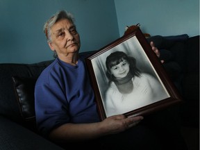 Paula Topic holds a portrait in 2015 of her daughter Ljubica Topic, who was kidnapped in 1971 and found dead four hours later. Police are offering a reward of $10,000 for information leading to the arrest of the little girl's killer.