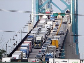 Traffic backs up entering Canada across the Ambassador Bridge between Windsor and Detroit.