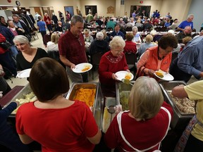 Close to 1,200 people enjoyed a turkey dinner during the annual American thanksgiving dinner at the Cottam United Church in Cottam on Nov. 26, 2015.