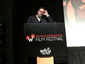 Vincent Georgie, executive director of the Windsor International Film Festival, speaks from the stage at the Chrysler Theatre before the closing night screening on Nov. 5, 2017.